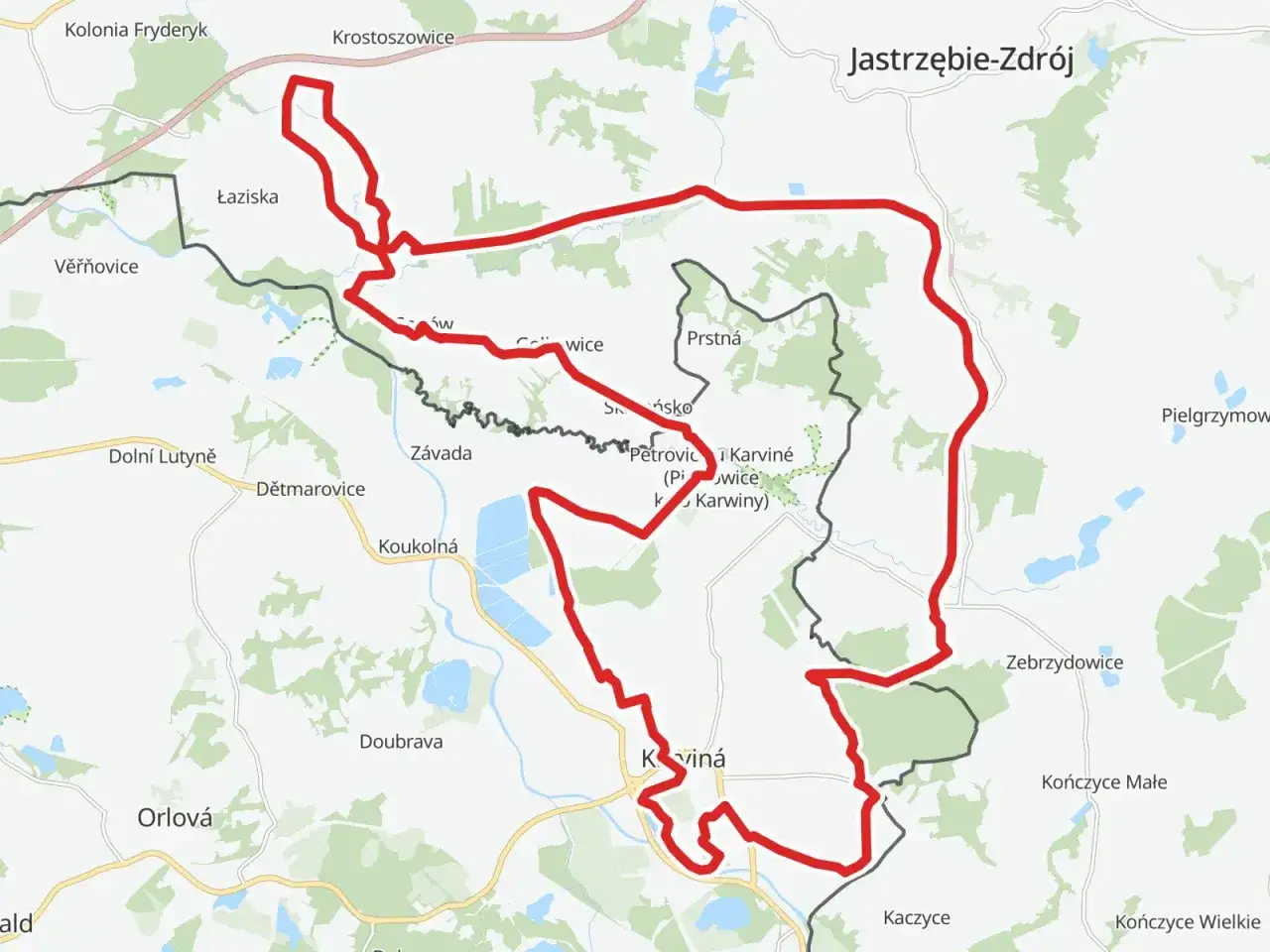 Mapa przedstawia trasę żelazny szlak rowerowy Jastrzębie-Zdr&oacute;j, biegnącą przez Łaziska, Petrovice i Karvinou, a także okoliczne miejscowości.